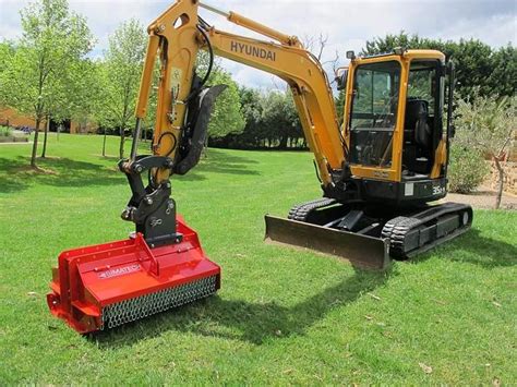 what size mini excavator for land clearing|mulch head for mini excavator.